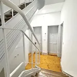 Minimalist Studio With Mezzanine